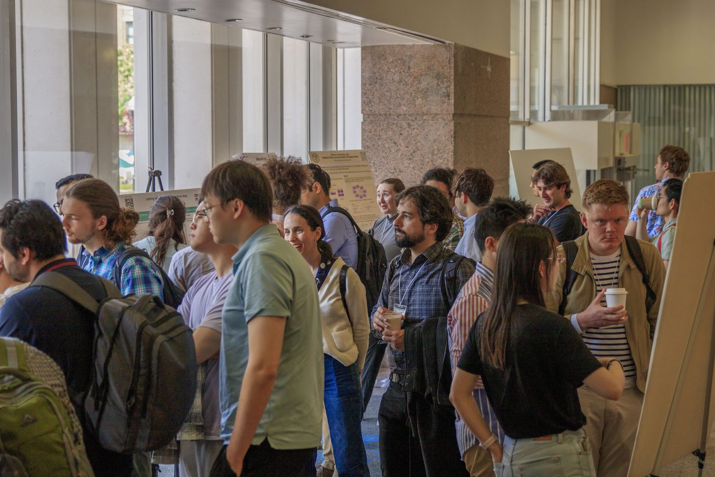 Attendees at the NESCW 2025 poster session