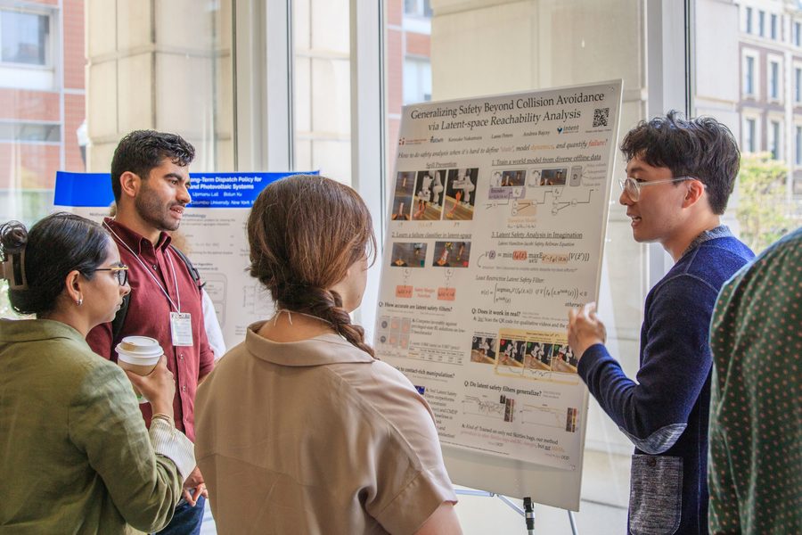 Student presenting research at NESCW 2025